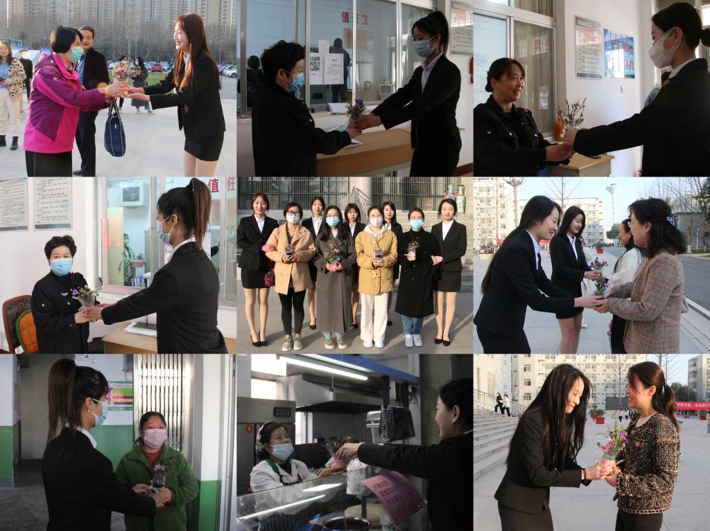 同学们向女教师赠花祝福 同学们向女教师赠花祝福